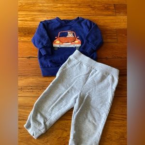Little Me navy fall sweater with flip up detail on front sweater and gray pants